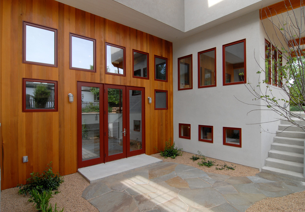 Wood and concrete exterior on modern Denver home