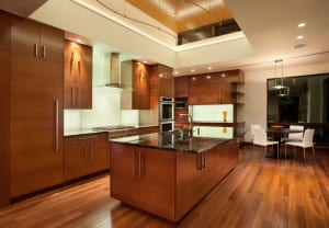 Large wood toned kitchen with radiant heat slab floors