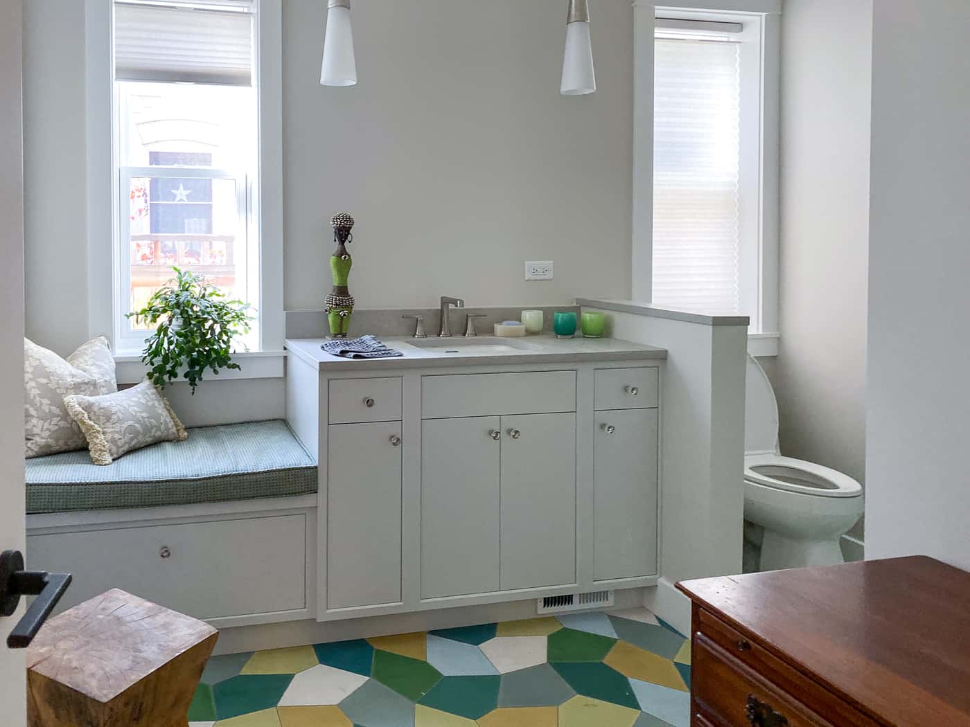 Boulder remodel - light and airy bathroom with custom colorful tile and window seat
