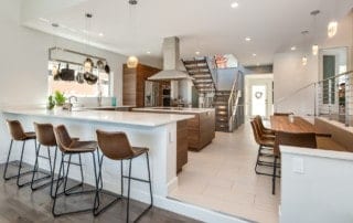 Contemporary Culinary Home - remodeled kitchen with white quartz countertops and ikea countertops